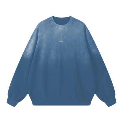 Blue sweatshirt with a brand logo on a white background