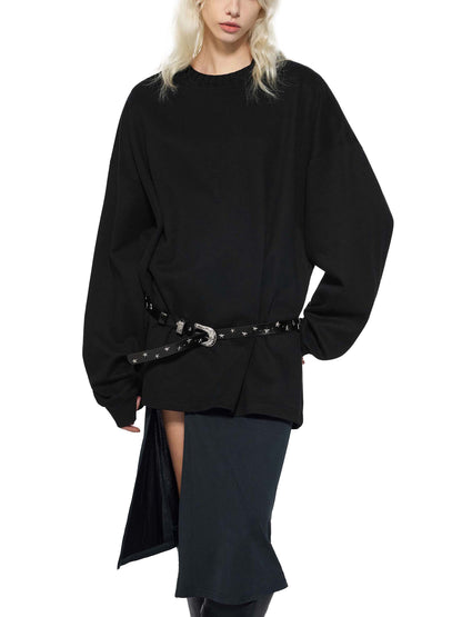 Person wearing a black outfit with a belt on a white background